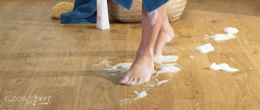 Woman walking barefoot in vinyl floor