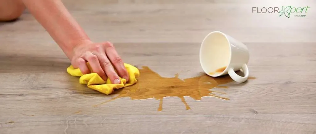 Cleaning a Coffee Spill On a Vinyl Floor.